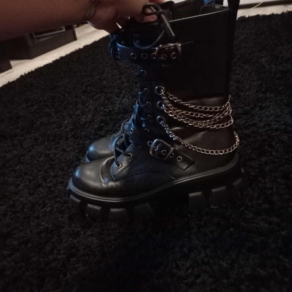 Black combat boots with chains